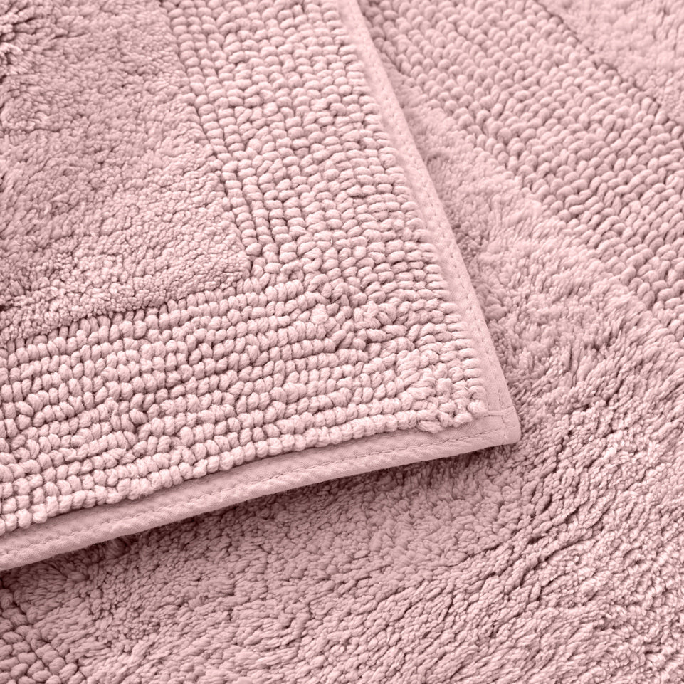 Tommy Bahama Longbranch Petal Pink Reversible Bath Mat Closeup | My Linen