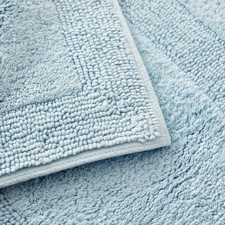 Tommy Bahama Longbranch Tidal Wave Reversible Bath Mat Closeup | My Linen